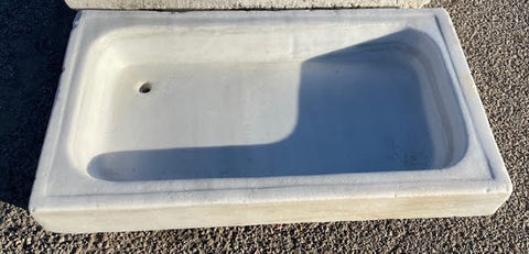 Antiguo fregadero de marmol