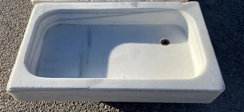 Antiguo fregadero de marmol