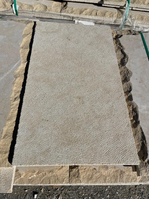 Losas de piedra caliza abujardada