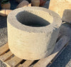 Pilon de piedra redondo.