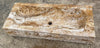 Pilónes de piedra travertino.