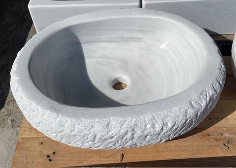 Lavabo ovalado de marmol
