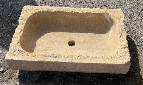 Pilon de piedra ocre