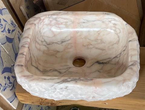 Lavabo de mármol rosa portugues