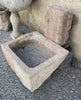 Fuente de piedra de pared.
