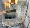 Fuente de piedra de pared.