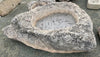 Piletas de rocas irregulares grandes.