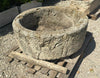 Pilon de piedra redondo.