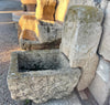 Fuente de piedra de pared.