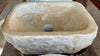 Lavabo de piedra travertino ocre.