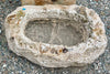 Pila de piedra viva.