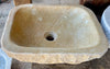 Lavabo de piedra travertino ocre.