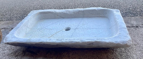 Antiguo fregadero de marmol