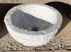 Lavabo redondo de marmol.