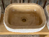 Lavabo de piedra travertino.