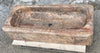 Pila de piedra travertino.