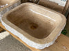 Lavabo de piedra travertino marron.
