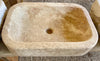 Lavabo de piedra travertino.
