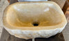 Lavabo de piedra travertino ocre.