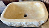 Lavabo de piedra travertino ocre.