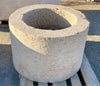 Pilon de piedra redondo.