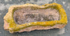 Pilón rectangular de piedra.