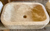 Lavabo de piedra travertino.