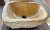 Lavabo de piedra travertino ocre.