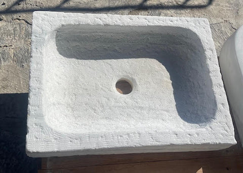 Lavabo de mármol abujardado