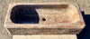Pilon travertino rojo oscuro.