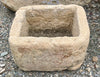 Pilón de piedra caliza.