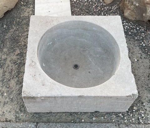 Lavabo de piedra gris