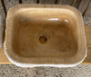 Lavabo de piedra travertino.