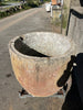 Pilon de piedra redondo.