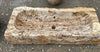 Pilónes de piedra travertino.