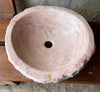 Lavabo de mármol rosa portugues.