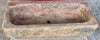 Pila de piedra travertino.