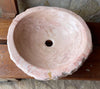 Lavabo de mármol rosa portugues.