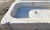 Antiguo fregadero de marmol