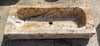 Pilónes de piedra travertino.