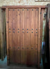 Puerta de clavos partida.