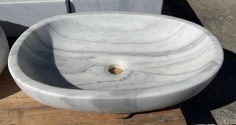 Lavabo ovalado de piedra