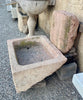Fuente de piedra de pared.