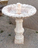 Fuente de piedra travertino pequeña.