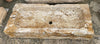 Pilónes de piedra travertino.