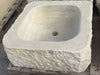 Lavabo de piedra.