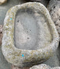 Pilón de piedra.