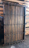 Ventana de madera con reja embutida.