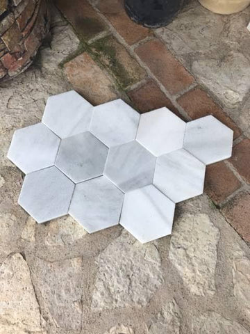 Losa de mármol blanco hexagonal
