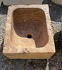 Lavabo de piedra travertino marrón.